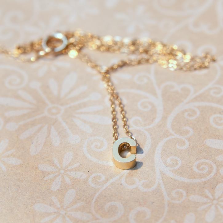 Image for small gold letter necklace with ID of: 1123756