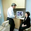 Photo for Hackensack's #1 dentist Rolando Cibischino, DMD explaining dental implant options to patient
