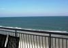 Photo for Enjoy the ocean breezes while relaxing and dining alfresco